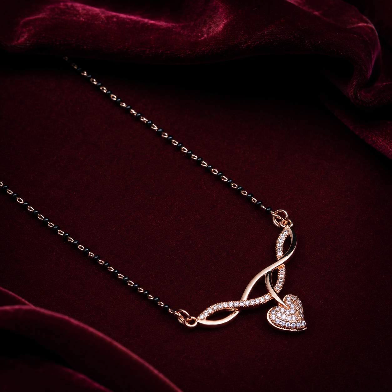 Forevershine Elegant Rose Gold Plated Infinity Curve Mangalsutra With Shimmering Pave-Set Cubic Zirconia Cz Stones And Heart Drop Dangler For Women, Alloy Metal, Polished Finish
