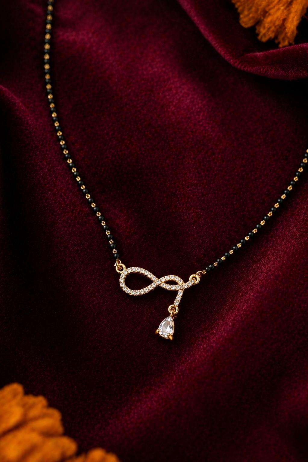 Forevershine Elegant Gold Plated Infinity Loop Mangalsutra With Pave-Set Cubic Zirconia Cz Stones And Pear Drop Dangler For Women, Alloy Metal, Polished Finish