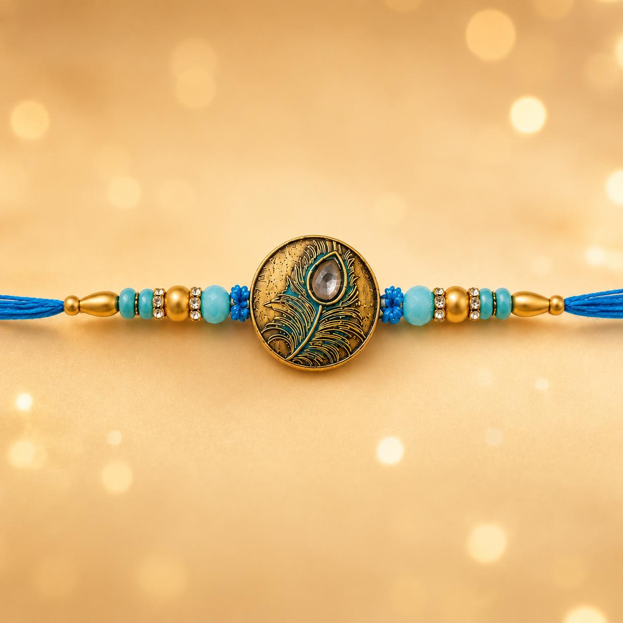 Peacock Feather Designer Rakhi With Blue Beads For Men & Boys(1 Rakhi With Roli, Chawal, Chandan & Mishri Pack) - Image 2