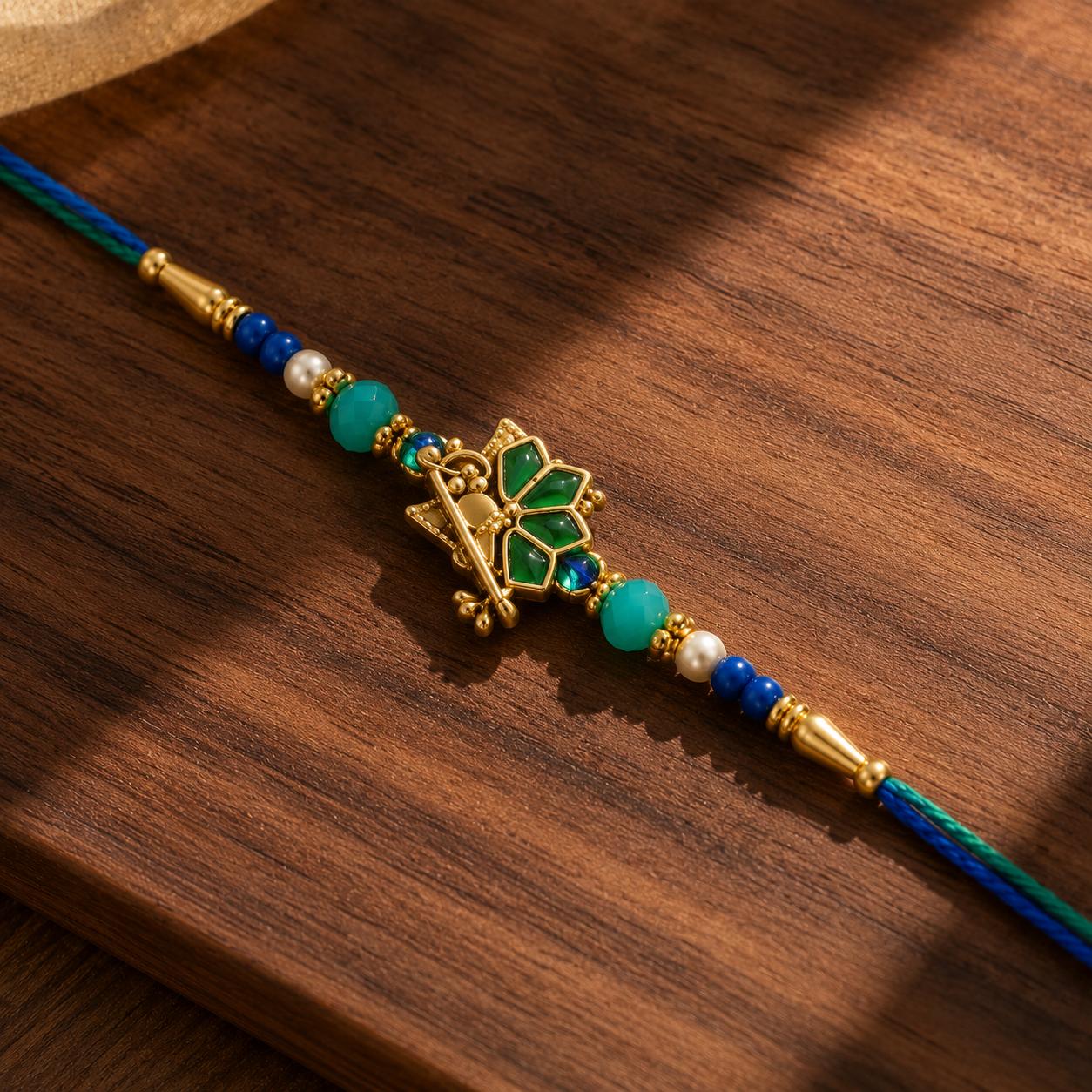 Peacock Feather Flute Designer Rakhi For Men & Boys(1 Rakhi With Roli, Chawal, Chandan & Mishri Pack) - Image 7