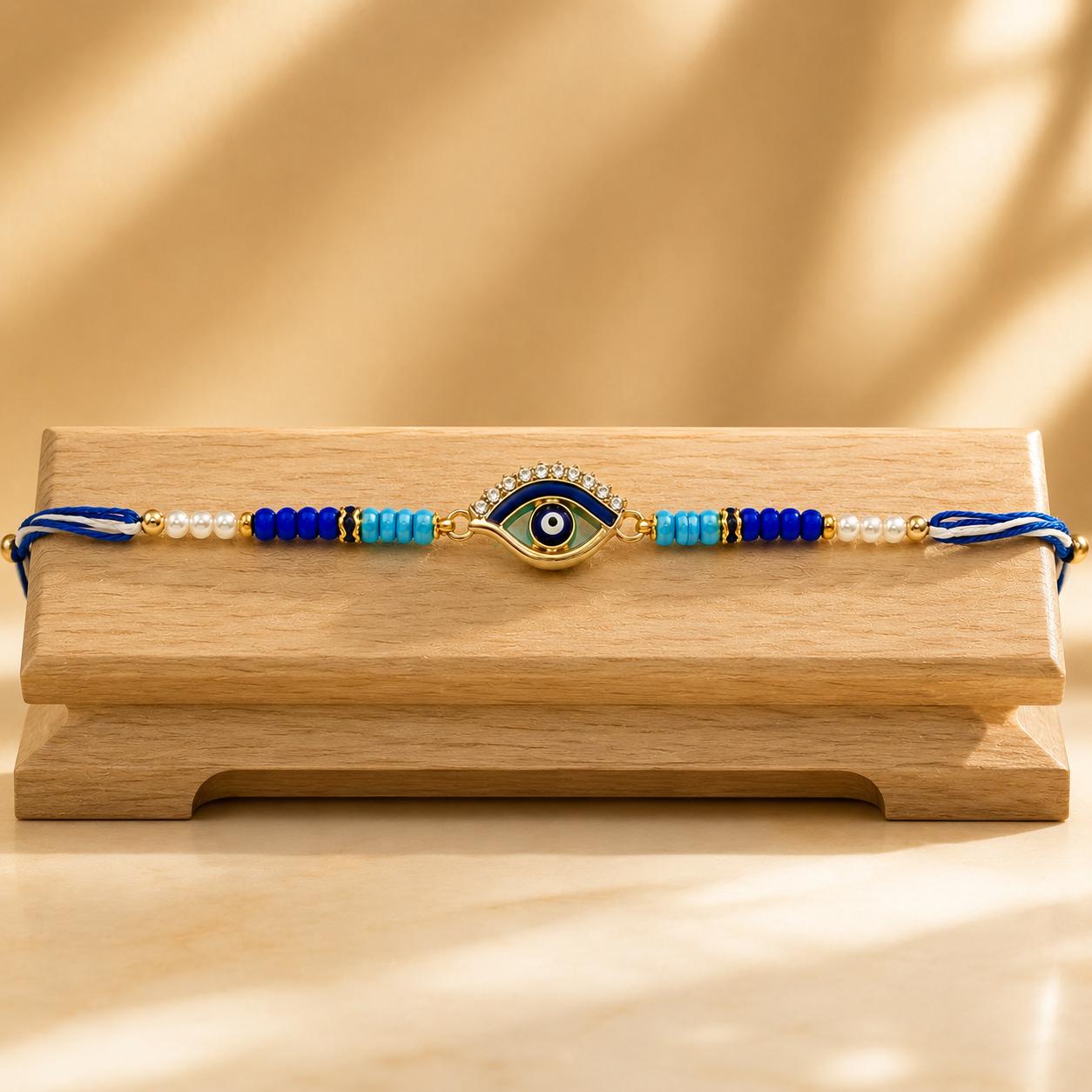 Evil Eye Designer Rakhi With Blue Beads For Men & Boys(1 Rakhi With Roli, Chawal, Chandan & Mishri Pack) - Image 8