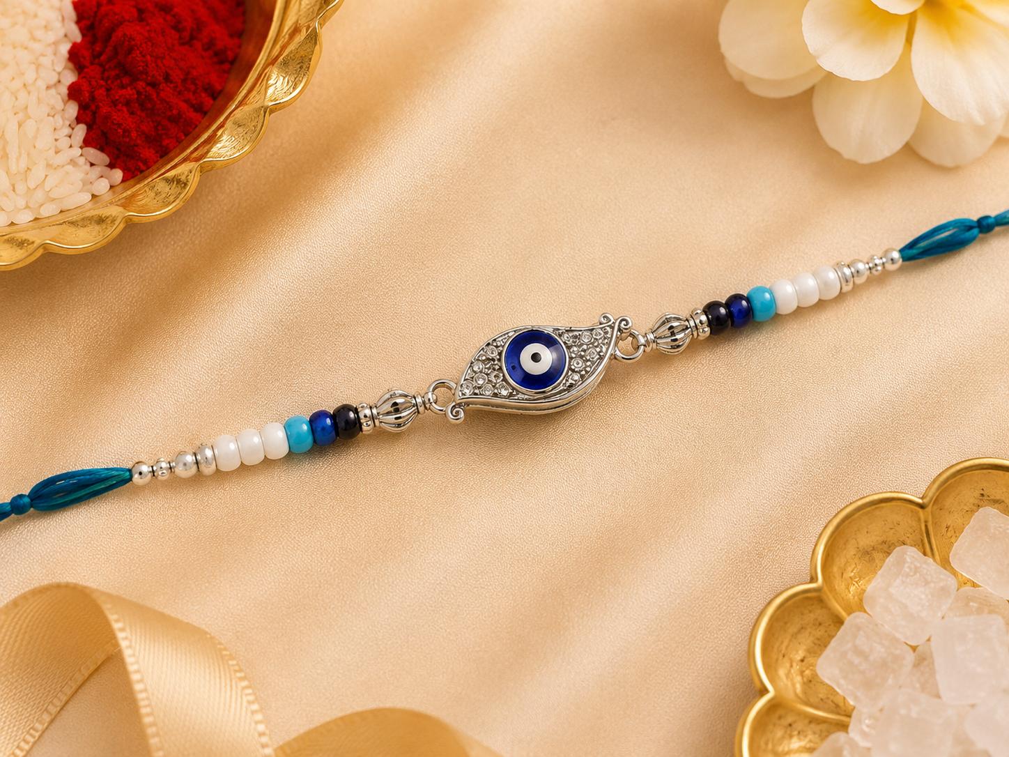 Evil Eye Designer Rakhi With Blue White Beads For Men & Boys(1 Rakhi With Roli, Chawal, Chandan & Mishri Pack) - Image 5