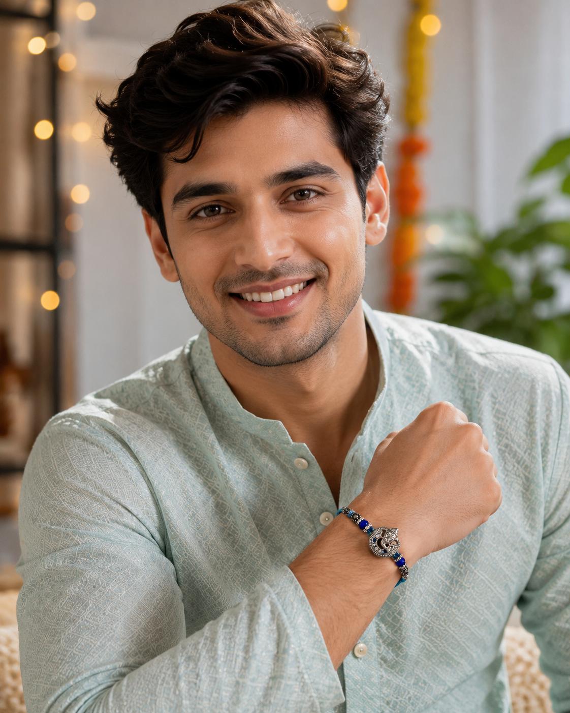Lord Ganesha Designer Rakhi With Blue Beads For Men & Boys(1 Rakhi With Roli, Chawal, Chandan & Mishri Pack) - Image 4