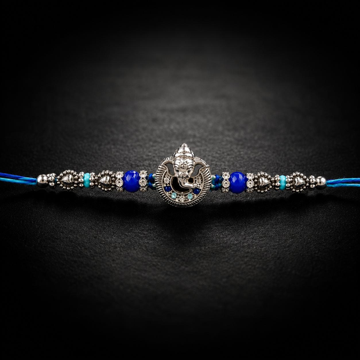 Lord Ganesha Designer Rakhi With Blue Beads For Men & Boys(1 Rakhi With Roli, Chawal, Chandan & Mishri Pack) - Image 5