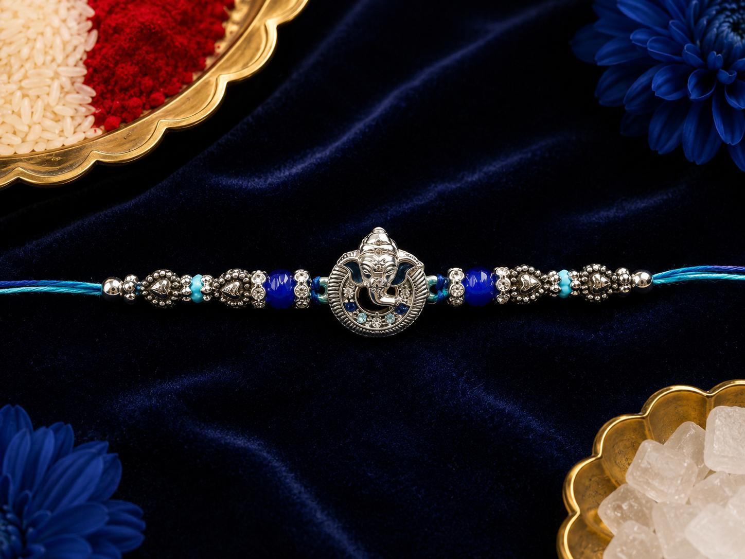Lord Ganesha Designer Rakhi With Blue Beads For Men & Boys(1 Rakhi With Roli, Chawal, Chandan & Mishri Pack) - Image 6