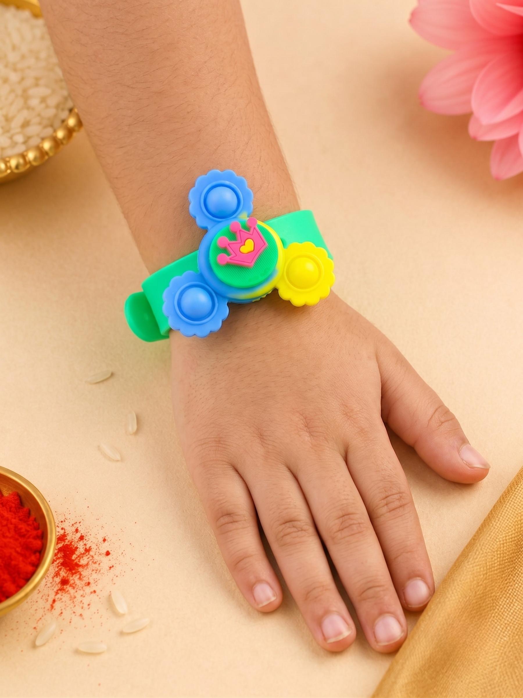 Kids Crown Led Light Up Spinner Wrist Band Rakhi (pack Of 1)