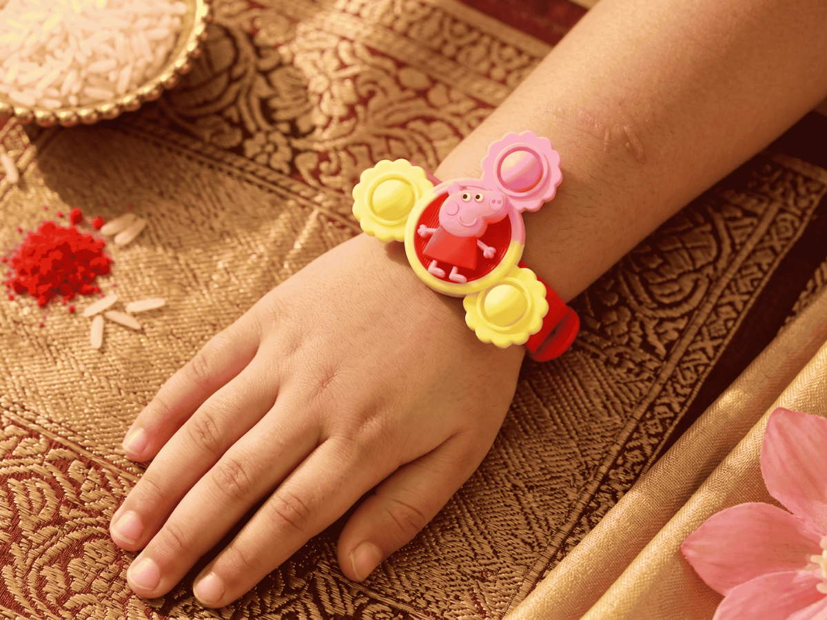 Kids Peppa Pig Led Light Up Spinner Wrist Band Rakhi (pack Of 1) - Image 2