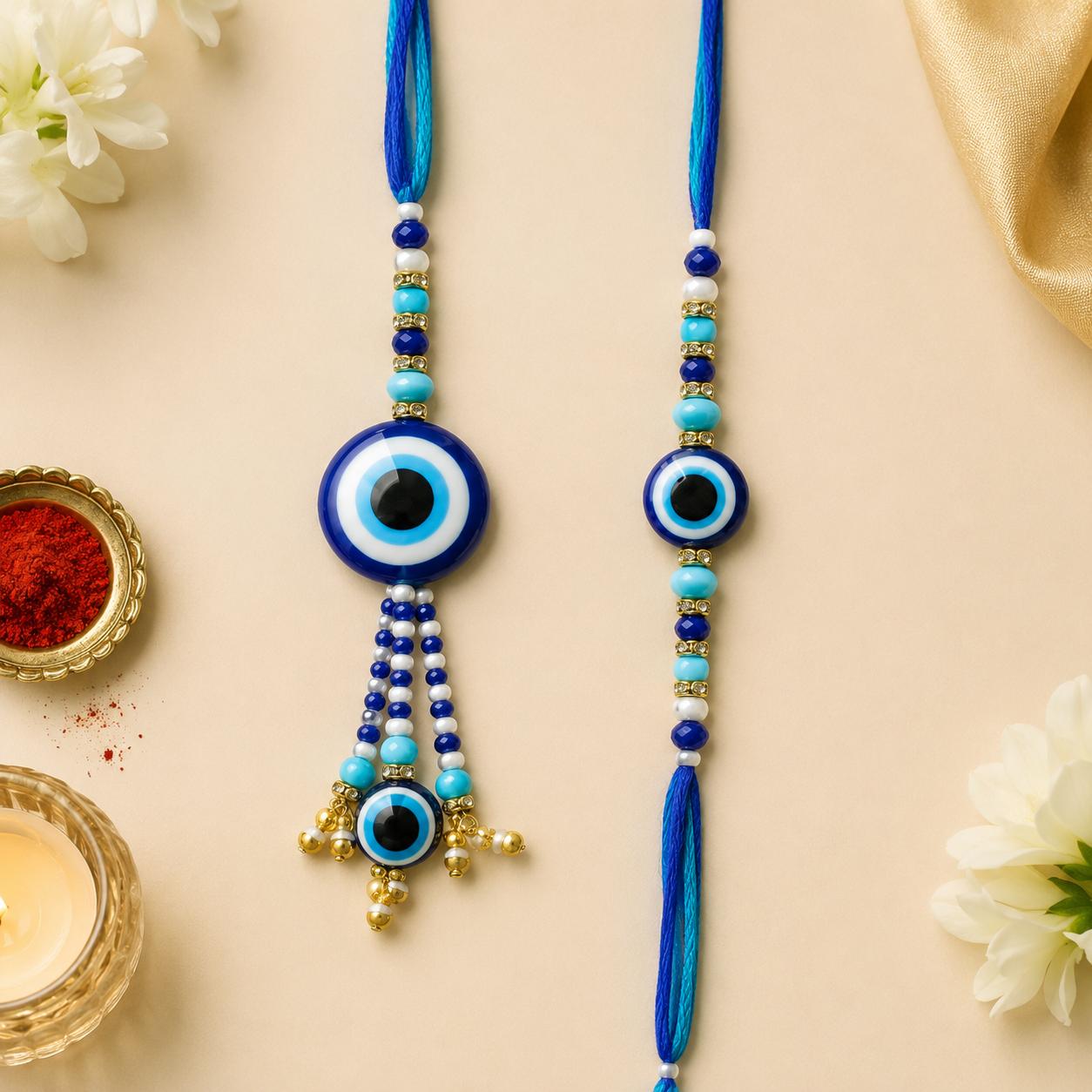 Evil Eye Bhaiya Bhabhi Rakhi Combo Set With Pearl Lumba(set Of 2 Rakhi For Bhaiya-Bhabhi With Roli, Chawal, Chandan & Mishri Pack) - Image 2
