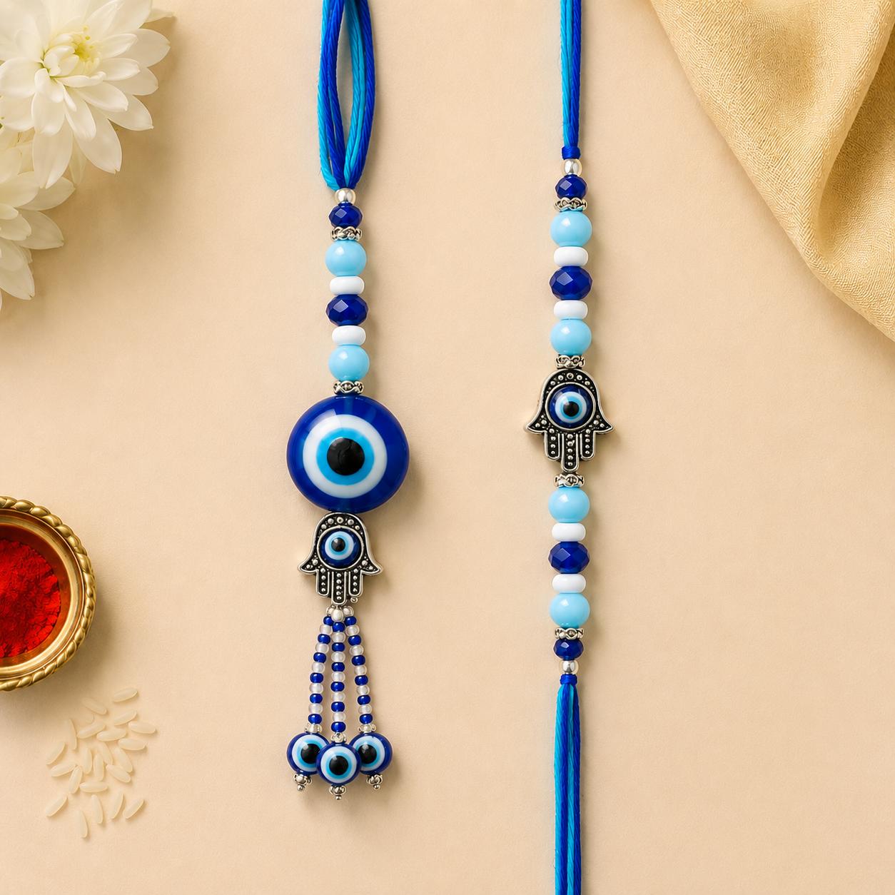 Hamsa Hand Evil Eye Bhaiya Bhabhi Rakhi Set With Lumba(set Of 2 Rakhi For Bhaiya-Bhabhi With Roli, Chawal, Chandan & Mishri Pack) - Image 3