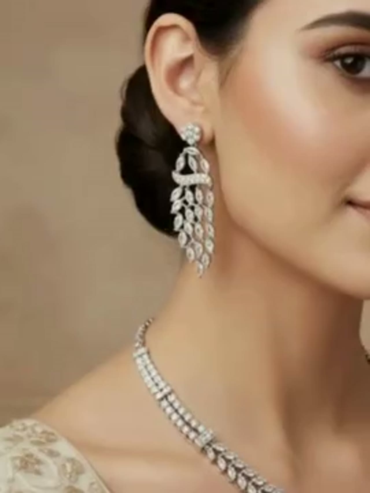 Woman styled in rose gold earrings from Forever Shine